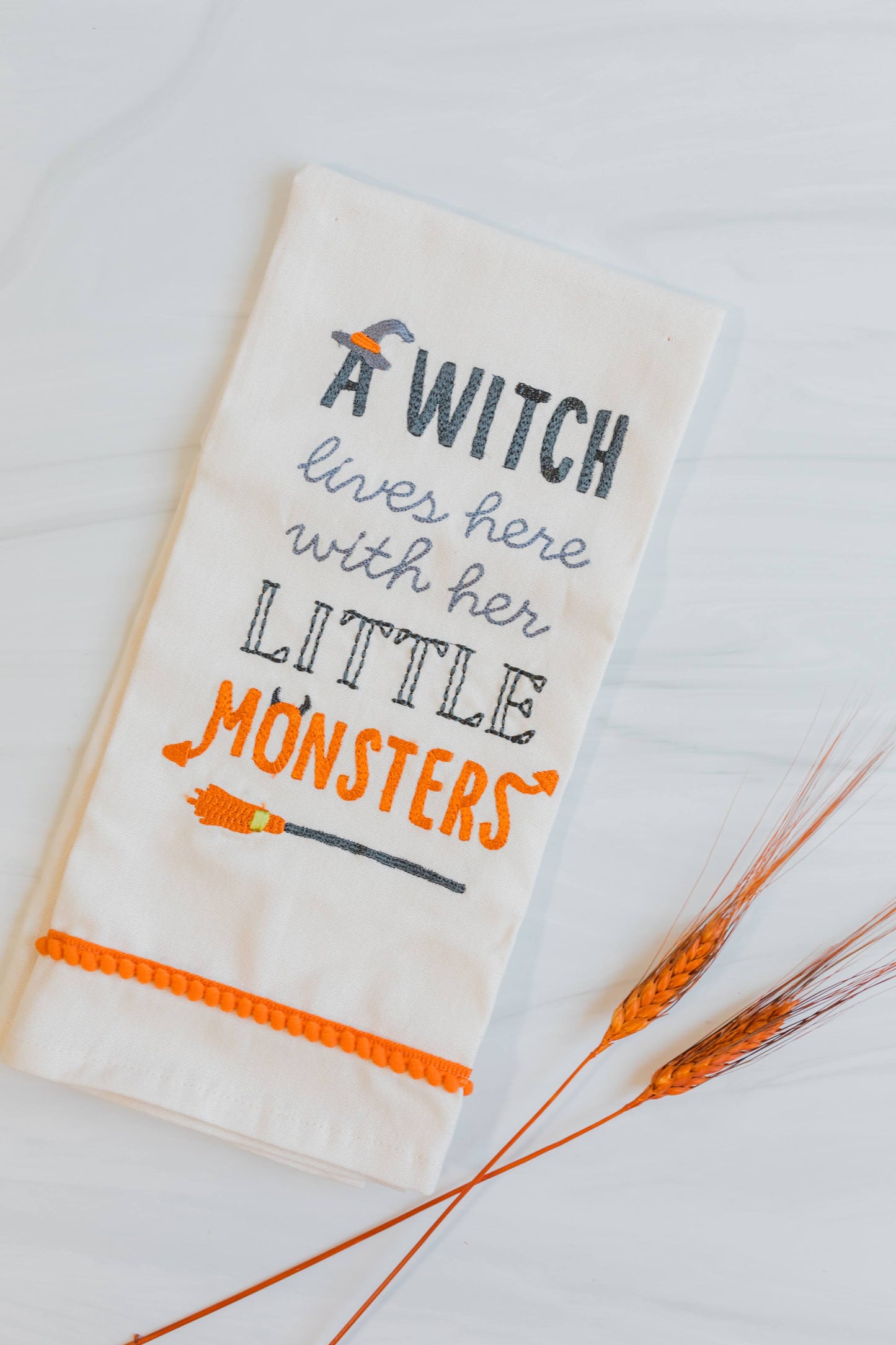 "A witch lives here" tea towel
